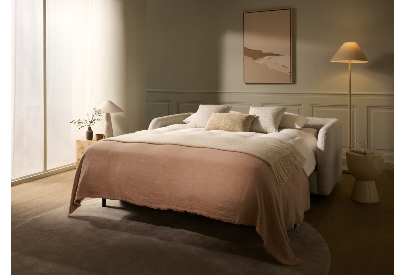 A Furl sofa bed, made up as a bed in a calm bedroom