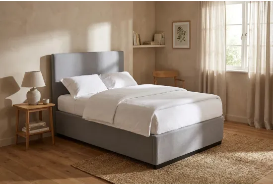 Max storage bed in a calm bedroom, shown in Alpaka Cloud with an optional headboard