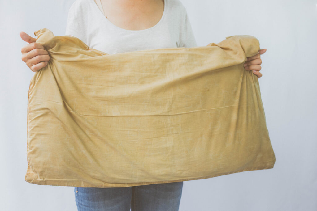 Removing yellow stains from a pillow