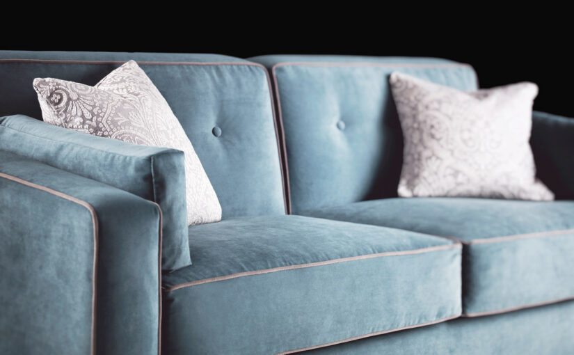 The Duette Sofa Bed from Furl, with complimenting cushions in Kirkby Smooth Coast and contrasting cushions in Romo Madigan Chaumont