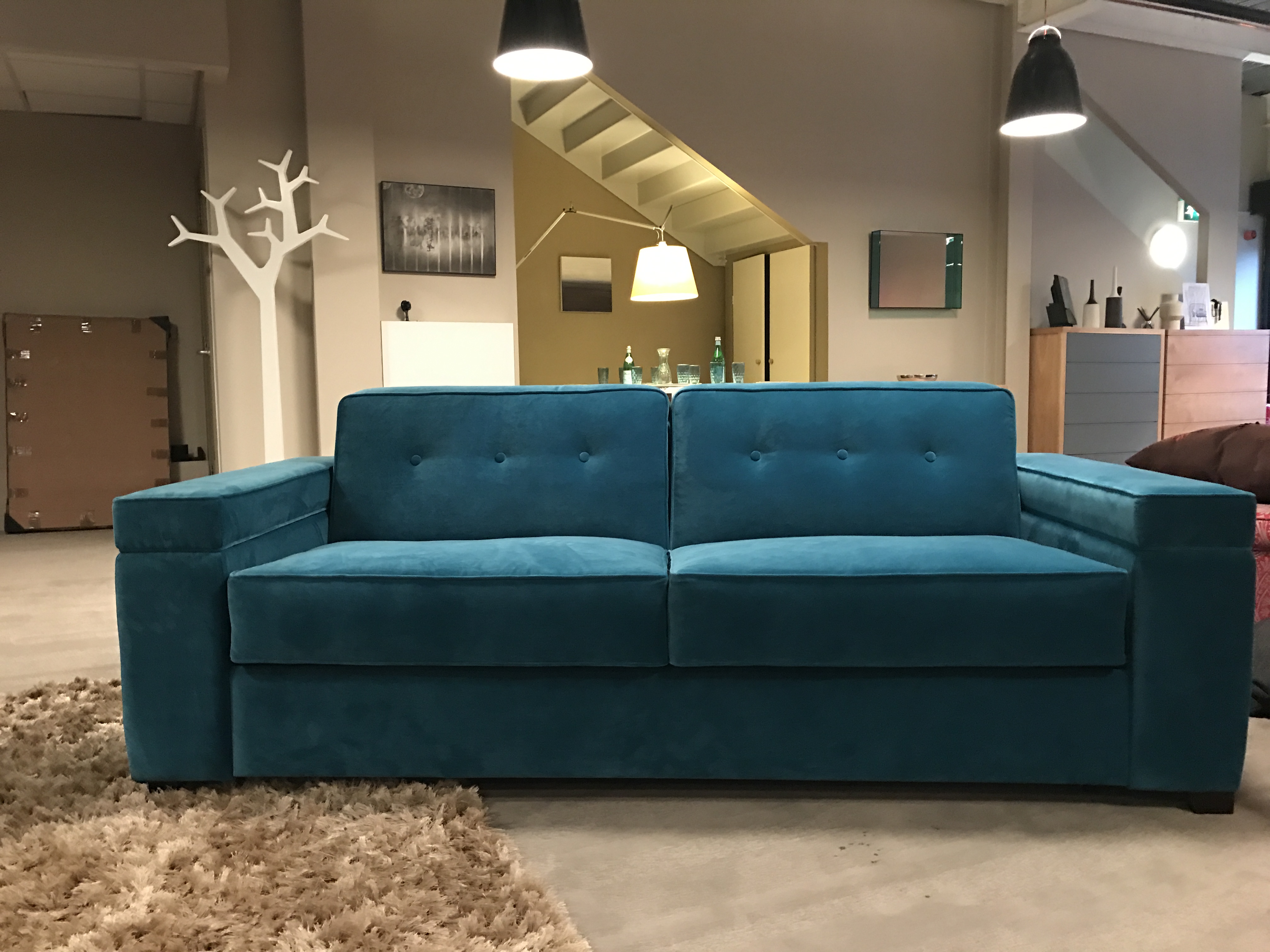 Sofa with storage arms