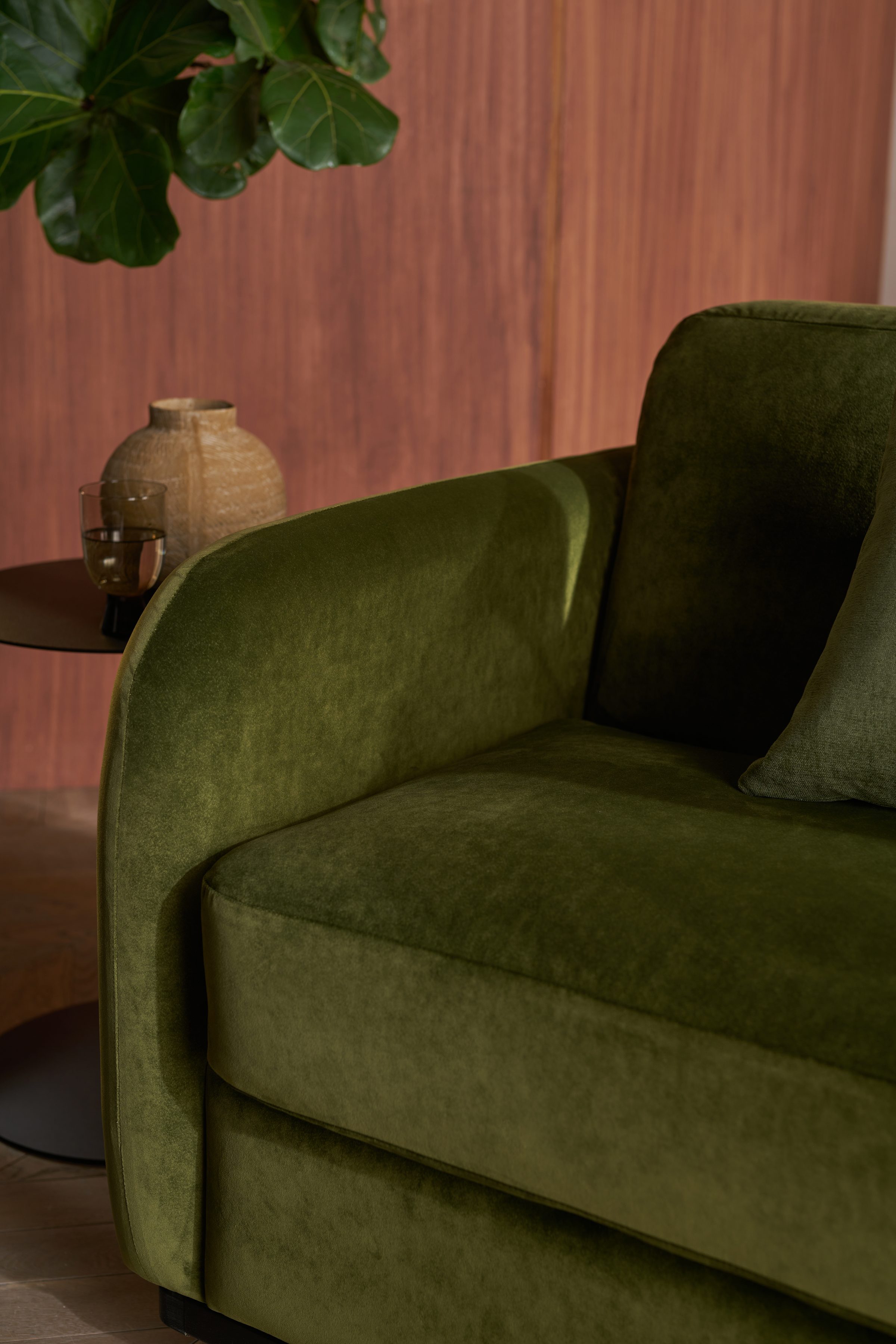 Cocoon forest green velvet arm detail close-up