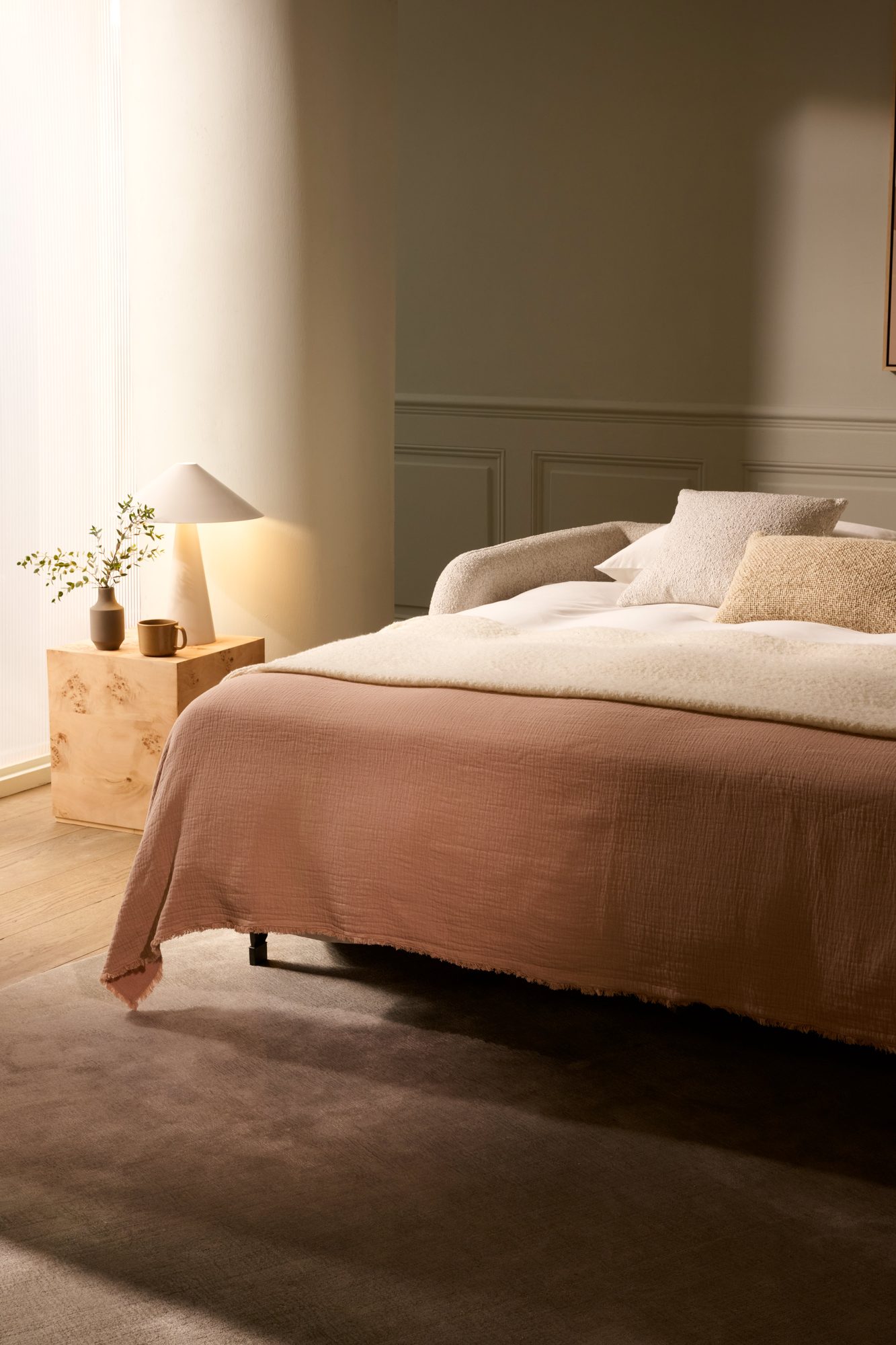 Cocoon sofa bed — fabric and form in a calm room