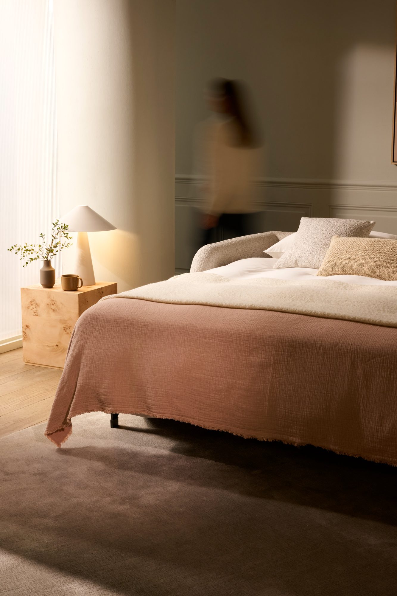 Cocoon sofa bed in a warm, considered living room