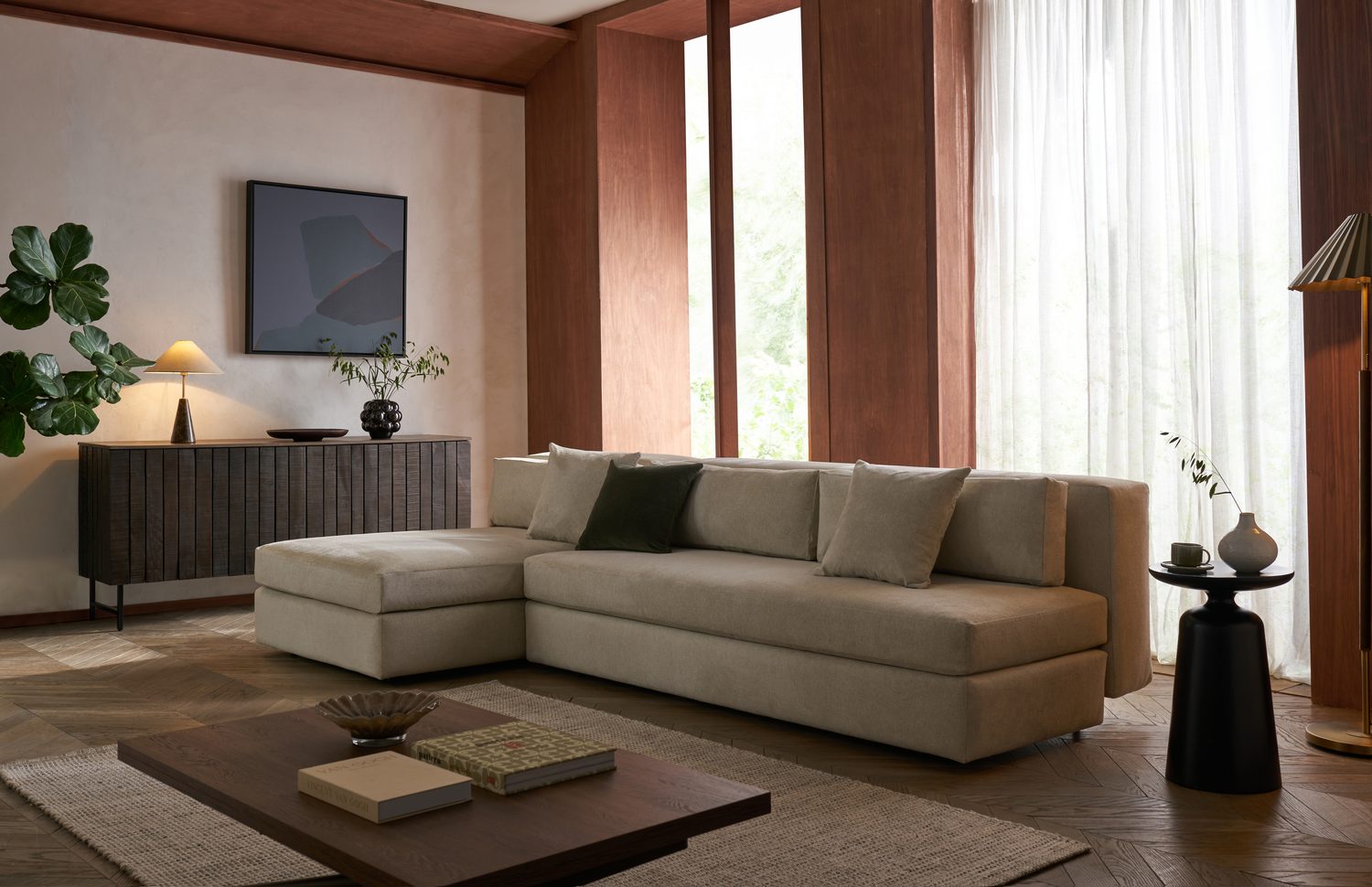 Piano sofa bed in a calm, light-filled living room