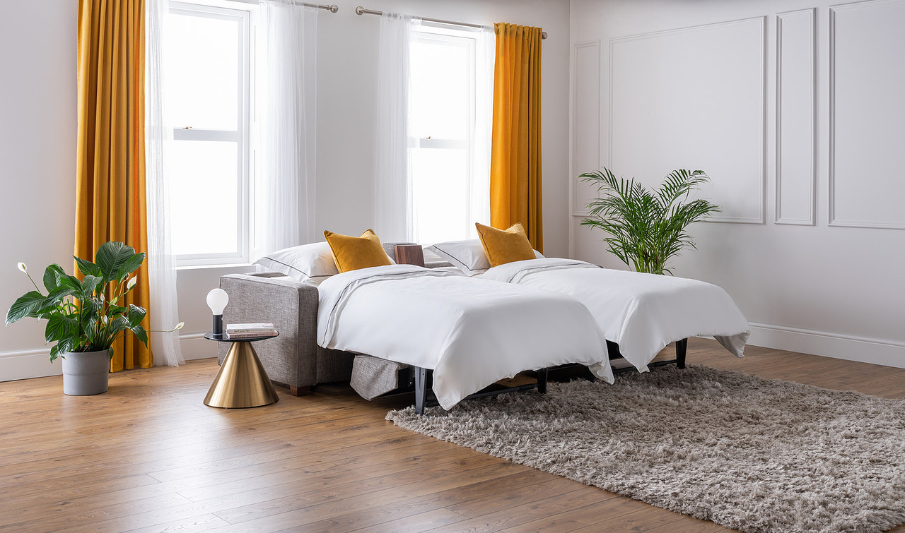 Side by Side sofa configuration as a guest room solution — two beds ready for two visitors in one room