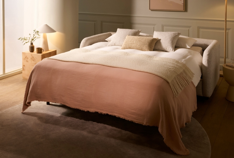 The Furl Cocoon sofa bed, made up as a bed